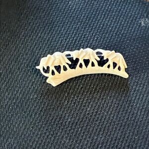 Elegant Ivory Brooch with Elephants